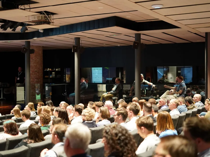 Delegates in conversation at an emailexpert event
